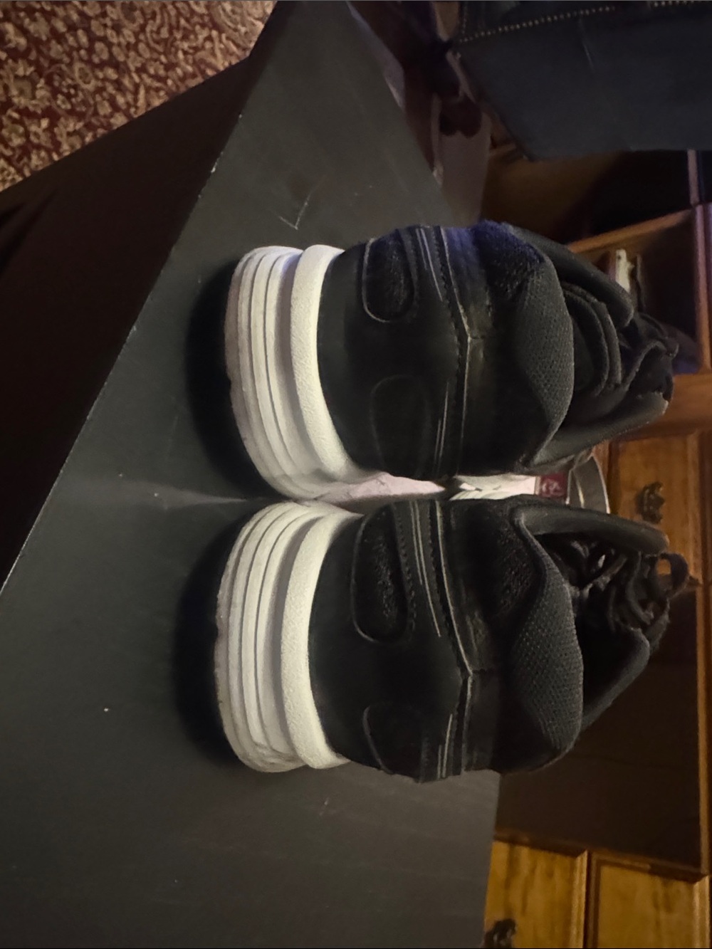 New Balance Black Men’s Sneakers with White Soles
